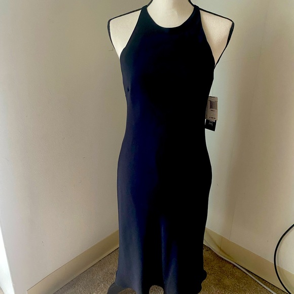 New with tags Classy black dress T length size 8. - Picture 1 of 5